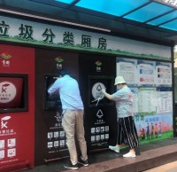 全區(qū)首個(gè)自動噴淋消毒除臭分類垃圾房