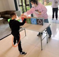 垃圾分類親子同行，美麗城鎮(zhèn)你我共建